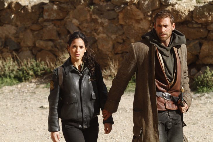 EMERALD CITY -- "Mistress-New-Mistress" Episode 103 -- Pictured: (l-r) Adria Arjona as Dorothy, Oliver Jackson Cohen as Lucas -- (Photo by: Rico Torres/NBC)