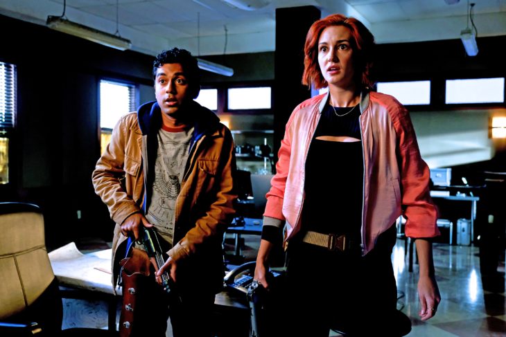 WYNONNA EARP -- "I Hope You Dance" Episode 212 -- Pictured: (l-r) Varun Saranga as Jeremy, Katherine Barrell as Officer Nicole Haught -- (Photo by: Michelle Faye/Syfy/Wynonna Earp Season 2)