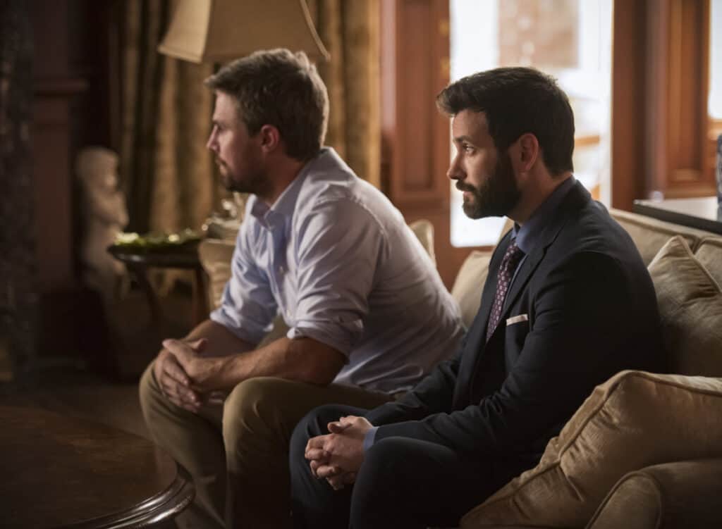 Arrow Season 8 Episode 1 - Stephen Amell as Oliver Queen/Green Arrow and Colin Donnell as Tommy Merlyn