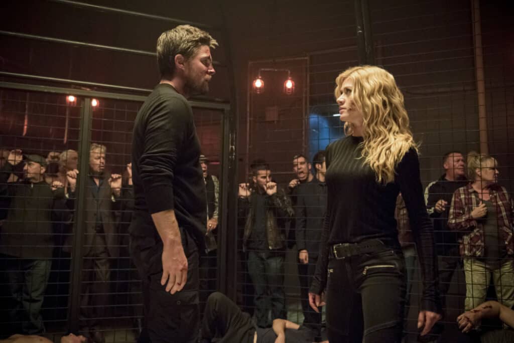 Arrow Season 8 Episode 5 - Stephen Amell as Oliver Queen/Green Arrow and Katherine McNamara as Mia