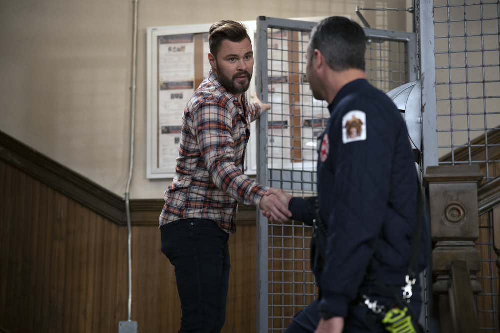 Chicago Fire Season 8 Episode 15, "Off The Grid" Pictured: (l-r) Patrick John Flueger as Adam Ruzek, Taylor Kinney as Kelly Severide