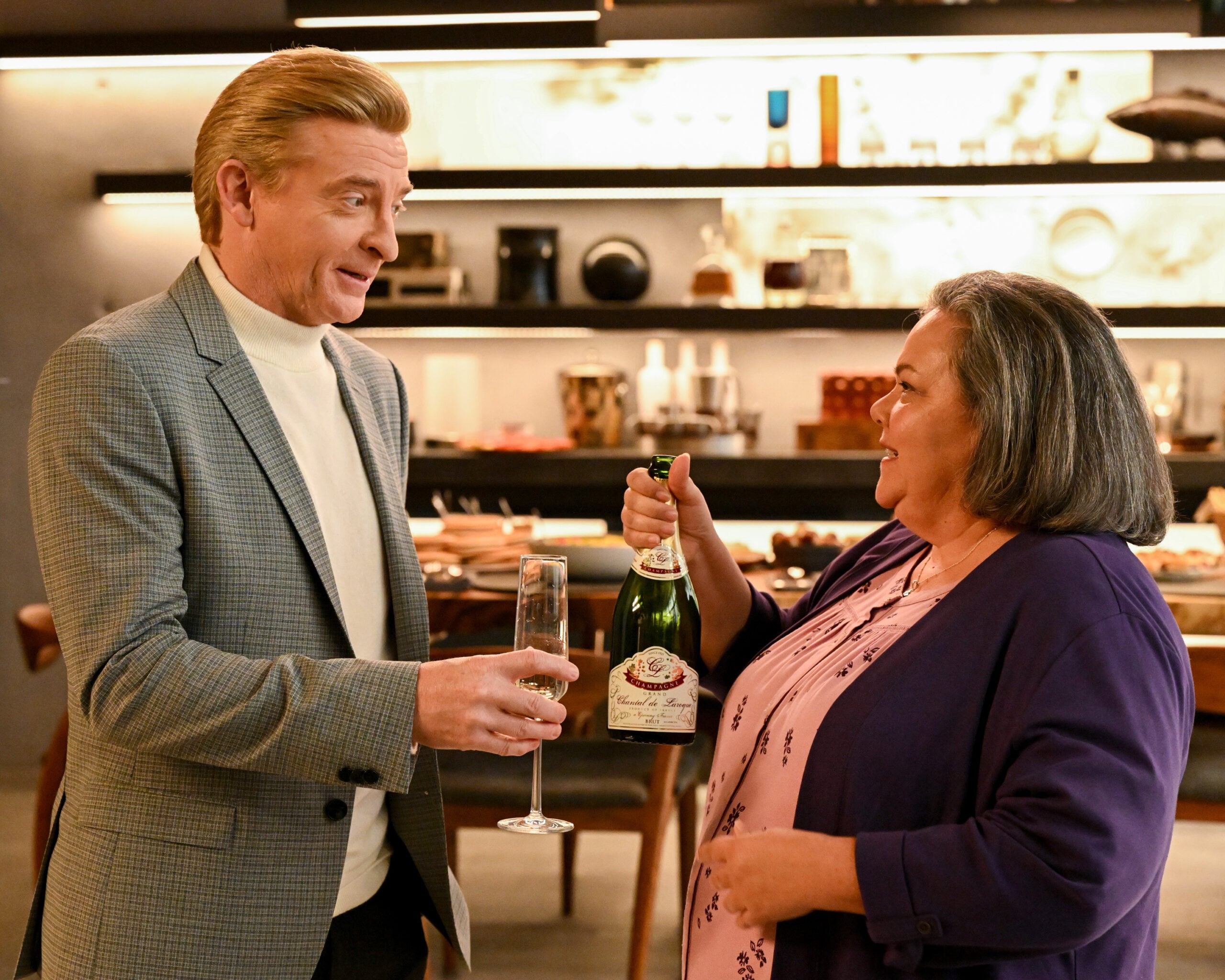 HOME ECONOMICS Season 2 Episode 21 “Book Deal, Terms Negotiable” RHYS DARBY, LIDIA PORTO