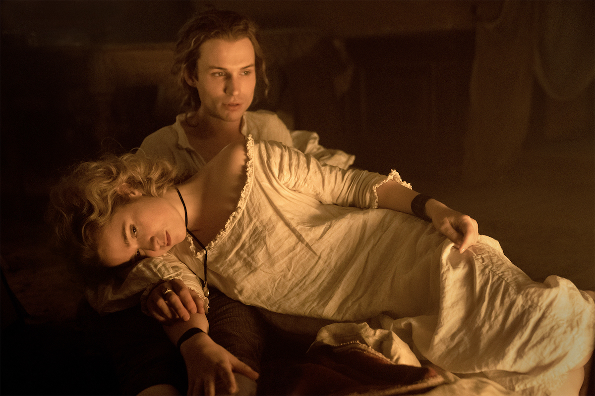 Dangerous Liaisons Season 1 2022 | Tell-Tale TV Dangerous Liaisons Episode 101_Love or War_Left to Right: Alice Englert ("Camille"), Nicholas Denton ("Pascal Valmont") (Photo: Starz)
