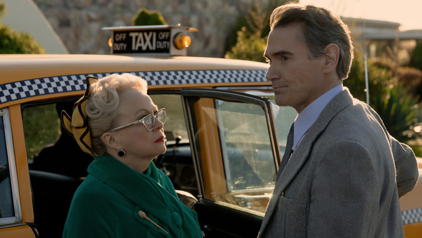 HELLO TOMORROW! Season 1 Episode 3, "A Traveling Salesman Travels" JACKI WEAVER, BILLY CRUDUP Photo via Apple TV+ | Tell-Tale TV HELLO TOMORROW! Season 1 Episode 3, "A Traveling Salesman Travels" JACKI WEAVER, BILLY CRUDUP Photo via Apple TV+