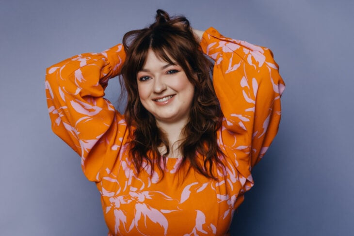 Kelli Ogmundson in orange