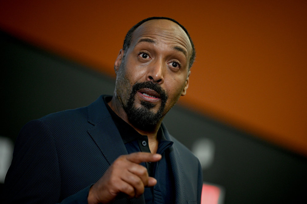 Still from The Irrational Season 1 Episode 1 of Jesse L. Martin as Alec Mercer. Photo is a medium shot of Martin at a low angle