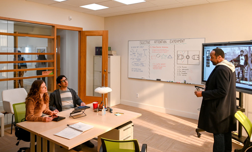 Still from The Irrational Season 1 Episode 2. Pictured: (l-r) Molly Kunz as Phoebe, Arash DeMaxi as Rizwan, Jesse L. Martin as Alec Mercer.