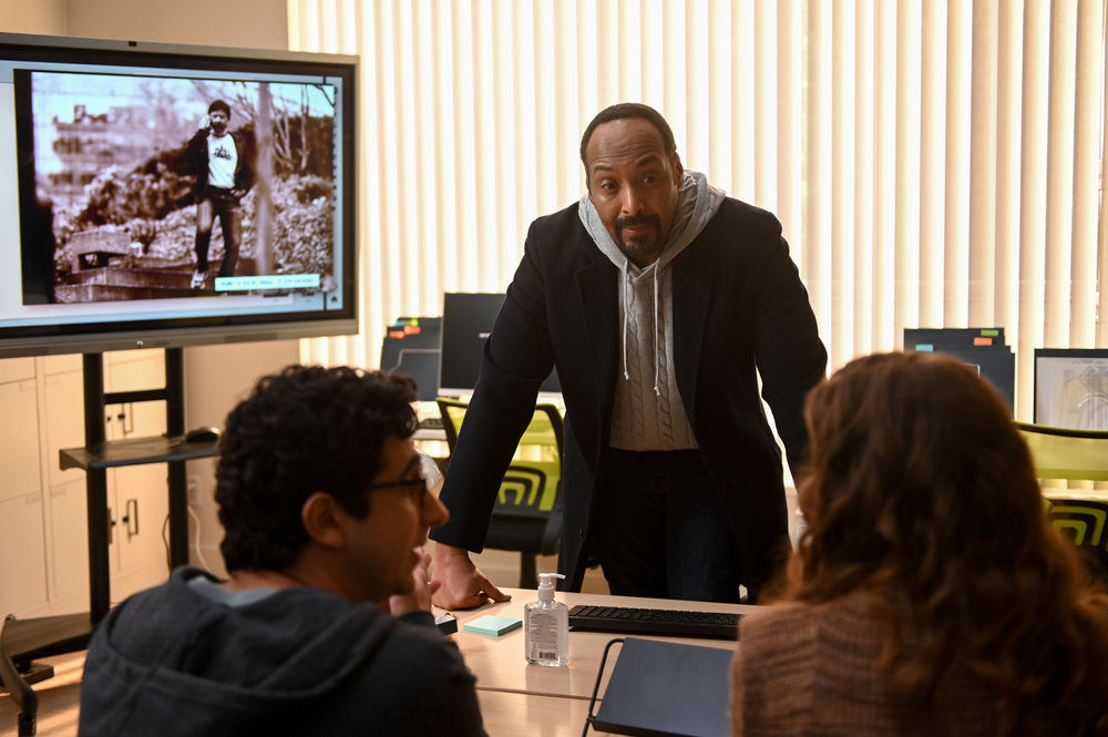 Still from the Irrational Season 1 Episode 2. Pictured: (l-r) Arash DeMaxi as Rizwan, Jesse L. Martin as Alec Mercer