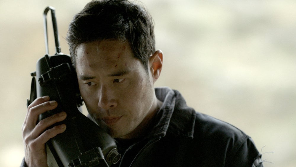 Still from Quantum Leap Season 2 Episode 1 of Raymond Lee as Dr. Ben Song