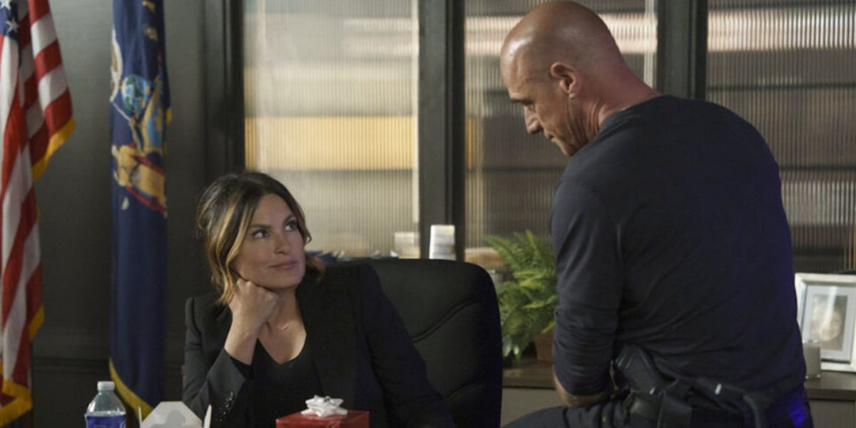Olivia Benson and Elliot Stabler sitting in Benson's office.