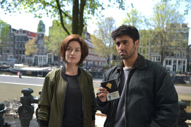 Still from Van der Valk episode "Redemption in Amsterdam: Part Two." hown from left to right: Maimie McCoy as Lucienne Hassell and Azan Ahmed as Eddie Suleman
