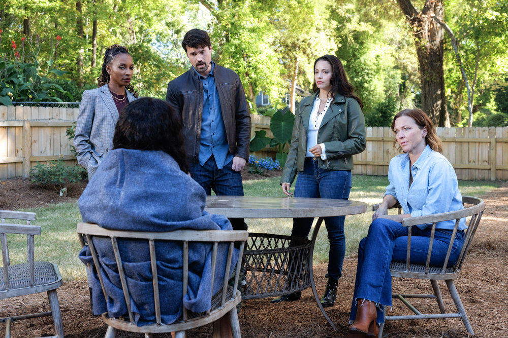 Still from Found Season 1 Episode 2 of Shanola Hampton as Gabi Mosely, Brett Dalton as Detective Mark Trent, Gabrielle Elise Walsh as Lacey Quinn, and Kelli Williams as Margaret Reed pictured from left to right