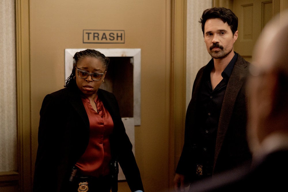 Still from Found Season 1 Episode 5 of Anisa Nyell Johnson as Detective Shaker and Brett Dalton as Detective Mark Trent pictured from left to right.