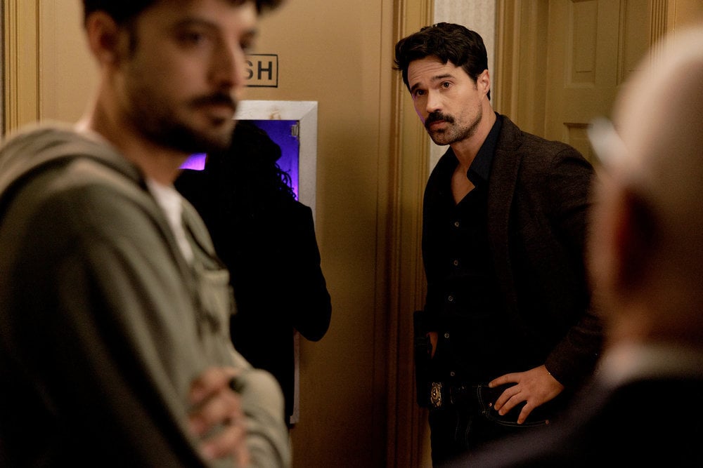 Still from Found Season 1 Episode 5 of Karan Oberoi as Dahn Rana and Brett Dalton as Detective Mark Trent pictured from left to right.