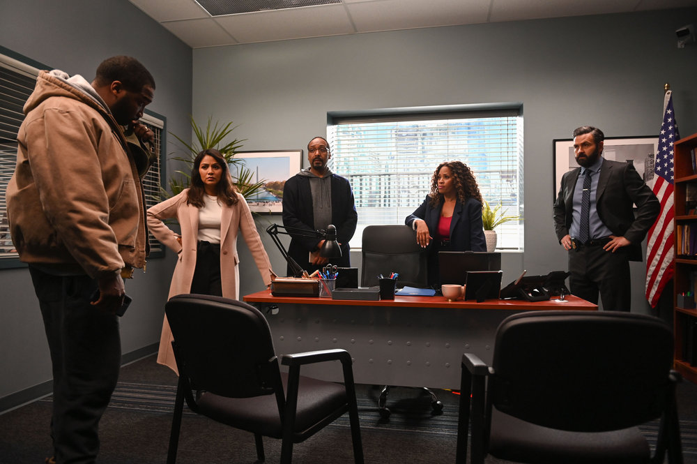 Still from The Irrational Season 1 Episode 4 of Jerod Haynes as Keith Moore, Karen David as Rose Dinshaw, Jesse L. Martin as Alec Mercer, Maahra Hill as Marisa, and Brian King as Jace Richards pictured from left to right.