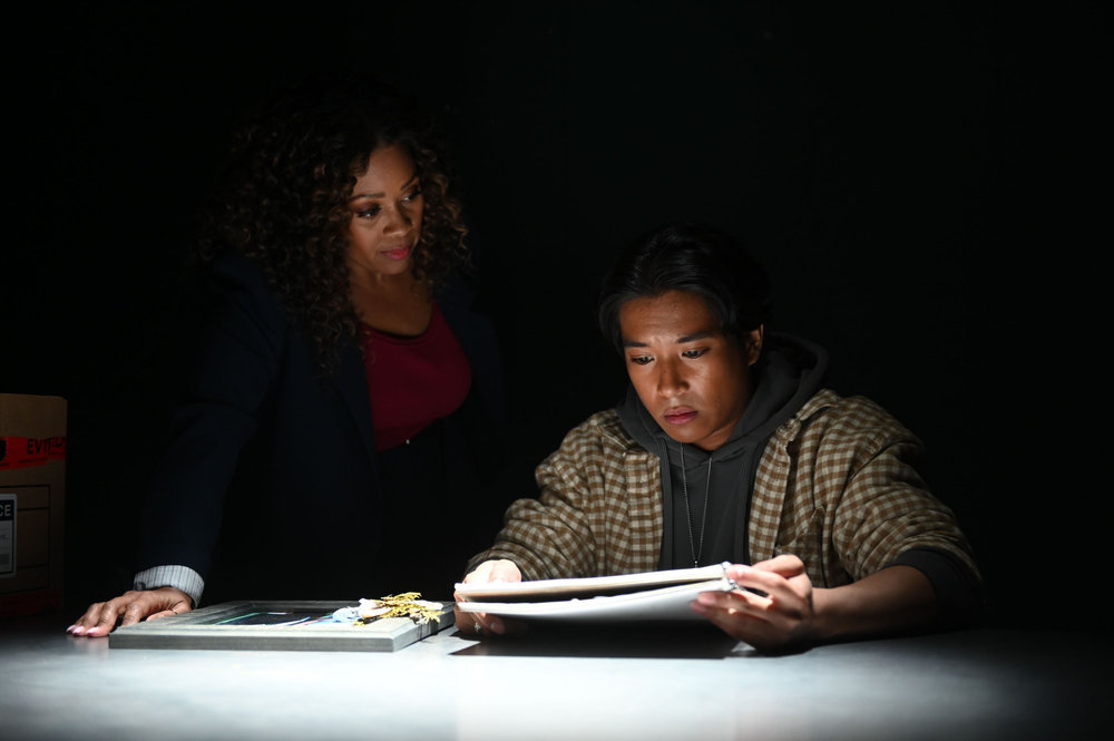 Still from The Irrational Season 1 Episode 4 of Maahra Hill as Marisa and Alec Carlos as Corey Gibson pictured from left to right