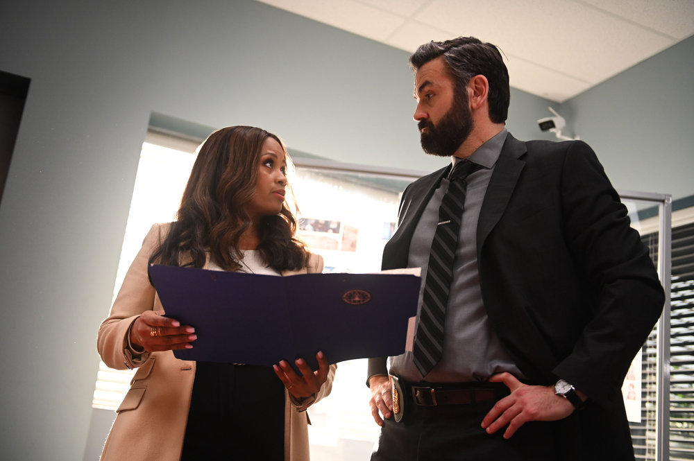 Still from The Irrational Season 1 Episode 5 of Maahra Hill as Marisa and Brian King as Jace Richards pictured from left to right.