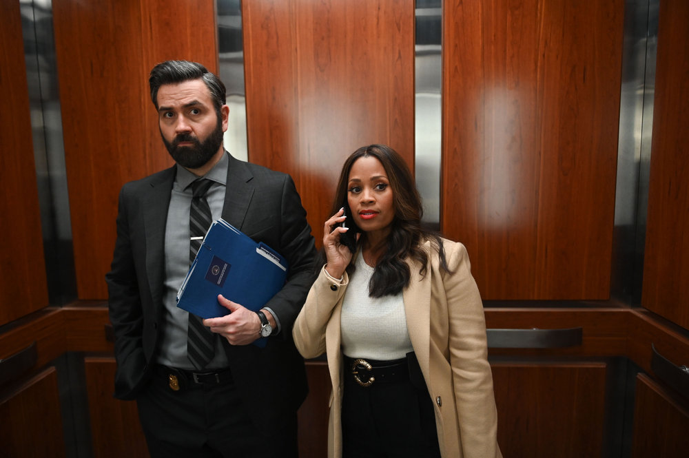 Still from The Irrational Season 1 Episode 5 of Brian King as Jace Richards and Maahra Hill as Marisa pictured from left to right