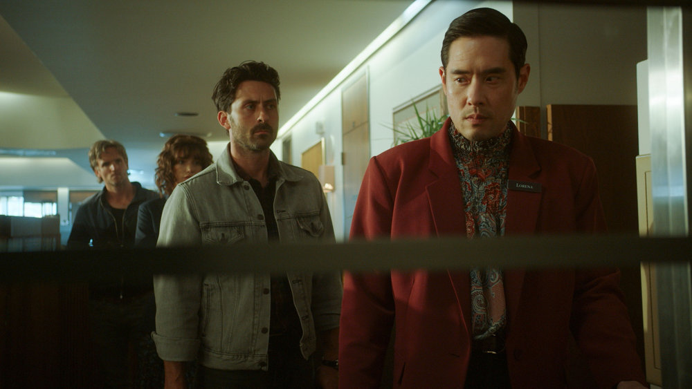 Still from Quantum Leap Season 2 Episode 2 of illy Lush as Vince, Janet Montgomery as Rebecca, Andy Bean as Ganz, and Raymond Lee as Dr. Ben Song pictured from left to right