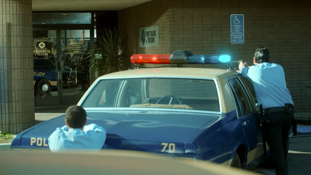 Still from Quantum Leap Season 2 Episode 2 of police and a police cruiser
