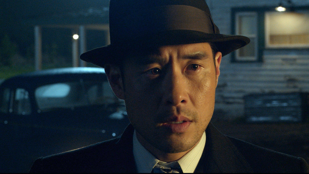 Still from Quantum Leap Season 2 Episode 3 of Raymond Lee as Dr. Ben Song.