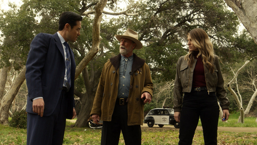 Still from Quantum Leap Season 2 Episode 3 of Raymond Lee as Dr. Ben Song and Caitlin Bassett as Addison pictured from left to right