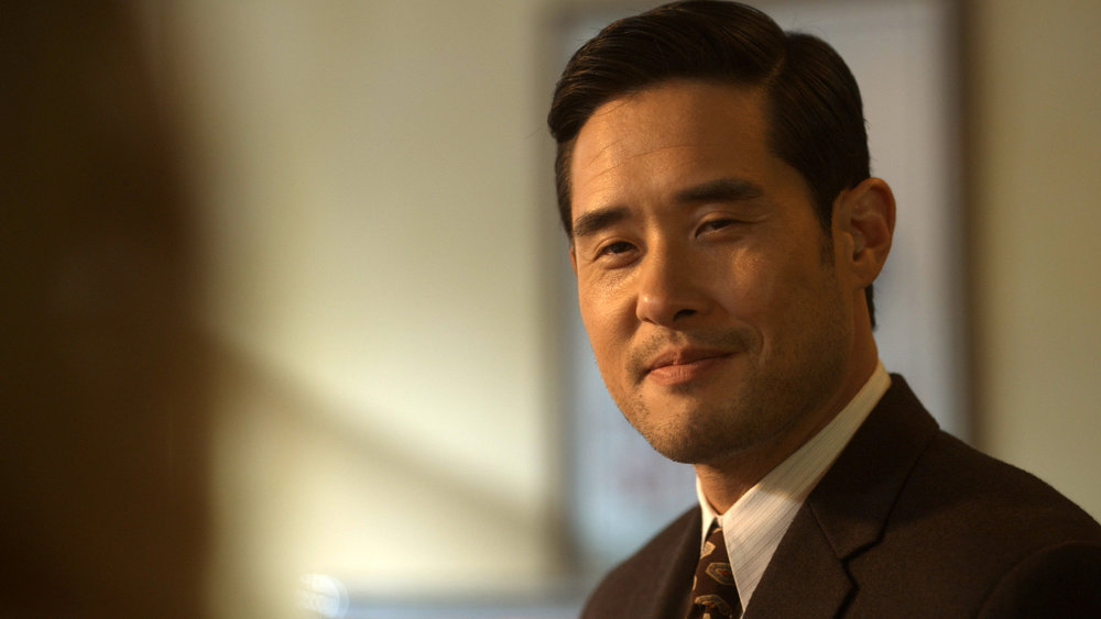 Still from Quantum Leap Season 2 Episode 1 of Raymond Lee as Dr. Ben Song.