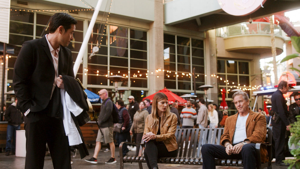 Still from Quantum Leap Season 2 Episode 4 of Raymond Lee as Dr. Ben Song, Caitlin Bassett as Addison, and Tim Matheson as Neal Russell pictured from left to right.