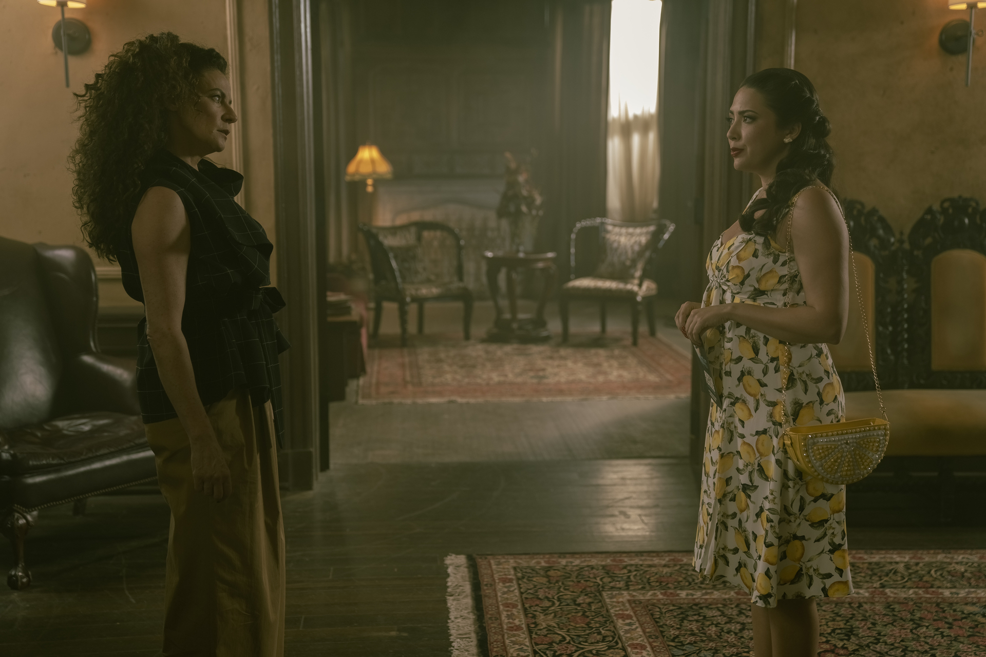 Doom Patrol Season 4 Episode 10 - Michelle Gomez and Charity Cervantes | Tell-Tale TV Still from Doom Patrol Season 4 Episode 10 of Michelle Gomez as Madam Rouge and Charity Cervantes as Isabel/Immortus pictured from left to right.