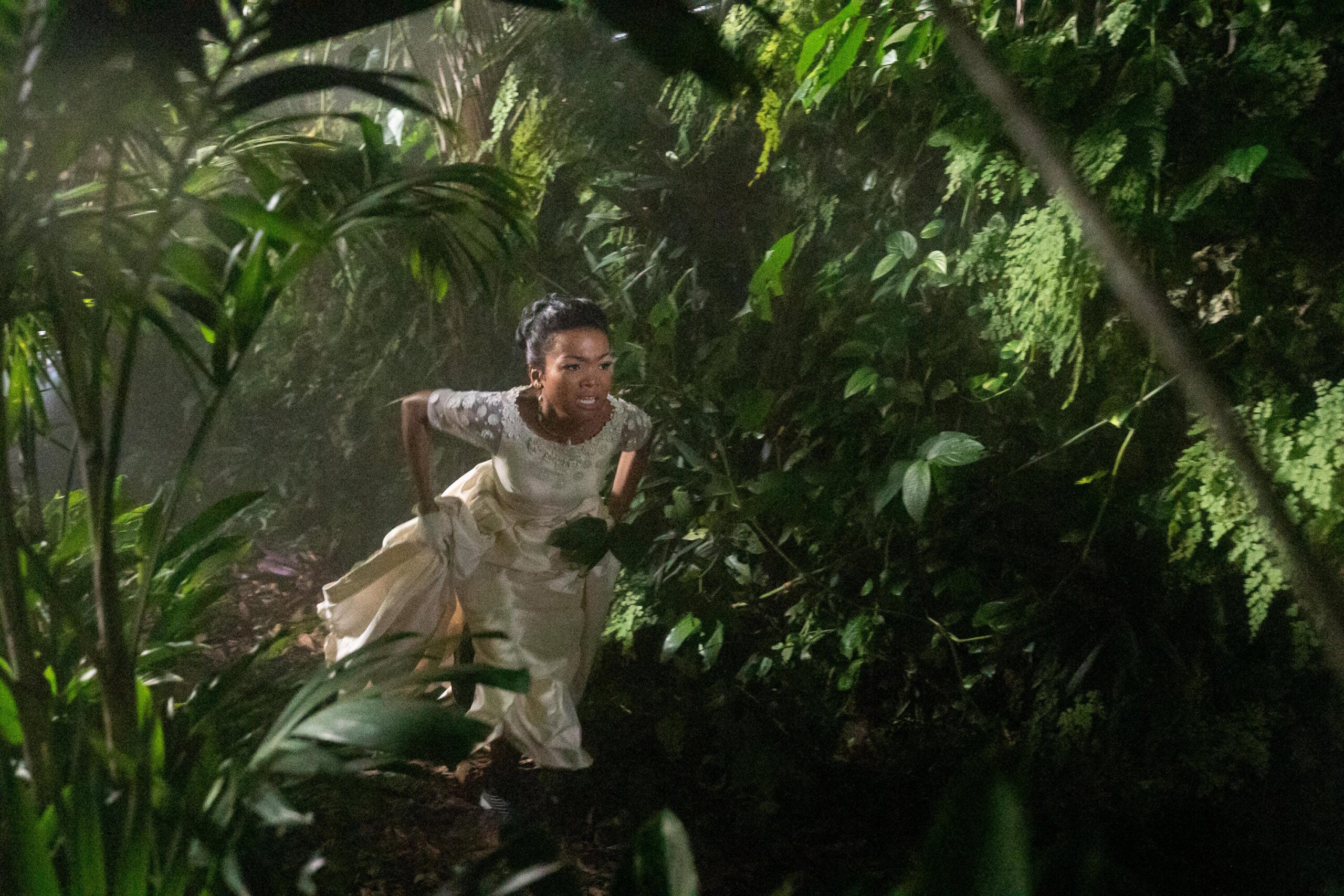 Still from Black Cake Season 1 Episode 1 or Mia Isaac as Covey.