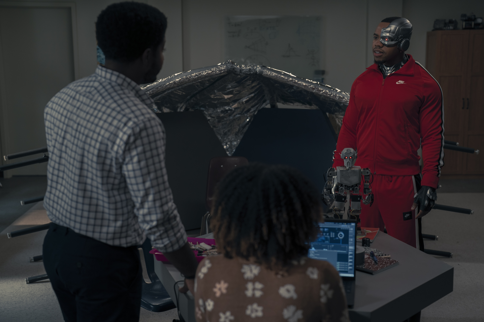 Doom Patrol Season 4 Episode 11 - Elijah Rashad Reed, Aniya Syndelle, and Jivon Reed | Tell-Tale TV Still from Doom Patrol Season 4 Episode 11 of Elijah Rashad Reed, Aniya Syndelle, and Jivon Reed pictured from left to right