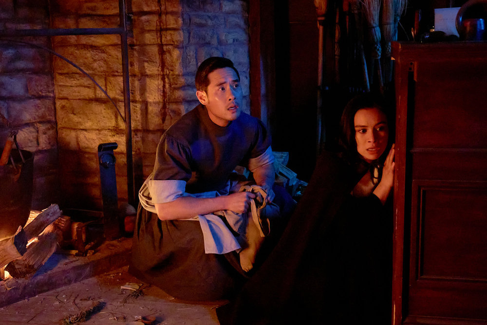 Still from Quantum Leap Season 2 Episode 7 of Raymond Lee as Dr. Ben Song and Madalyn Horcher as Goody pictured from left to right.