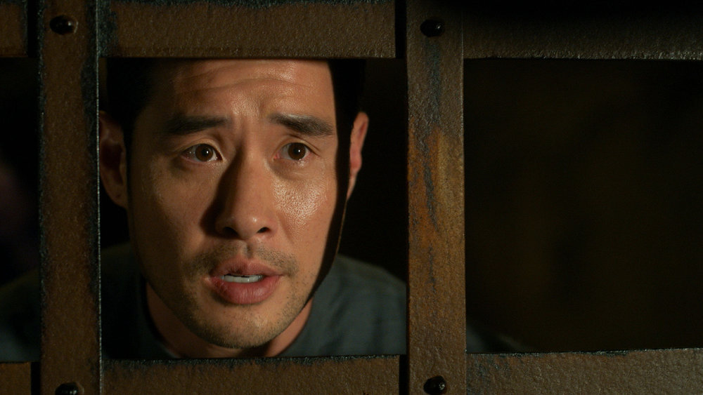 Still from Quantum Leap Season 2 Episode 7 of Raymond Lee as Dr. Ben Song.