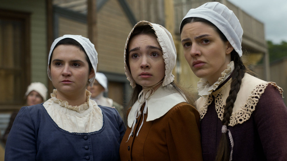 Still from Quantum Leap Season 2 Episode 7 of Jett Wilder as Hope, Ruby Jay as Faith, and Shelby Lee as Charity pictured from left to right.
