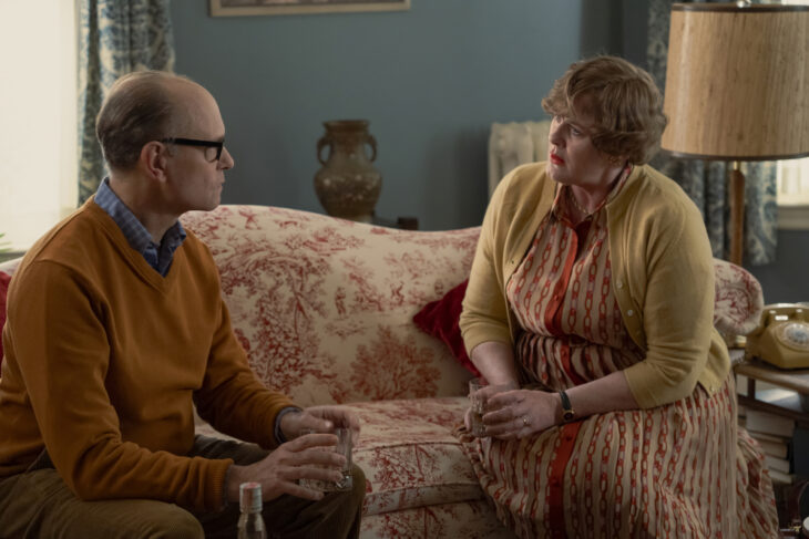 Still from Julia Season 2 Episode 7 of avid Hyde Pierce and Sarah Lancashire sitting on a couch talking.