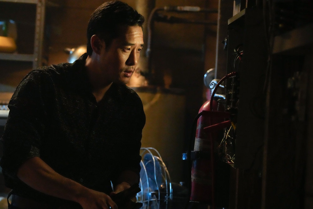 Still from Quantum Leap Season 1 Episode 9 of Raymond Lee as Dr. Ben Song.