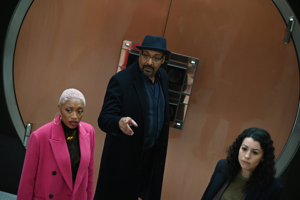Still from The Irrational Season 1 Episode 9 of Travina Springer as Kylie, Jesse L. Martin as Alec Mercer, and Paloma Nozicka as Morgan pictured left to right.
