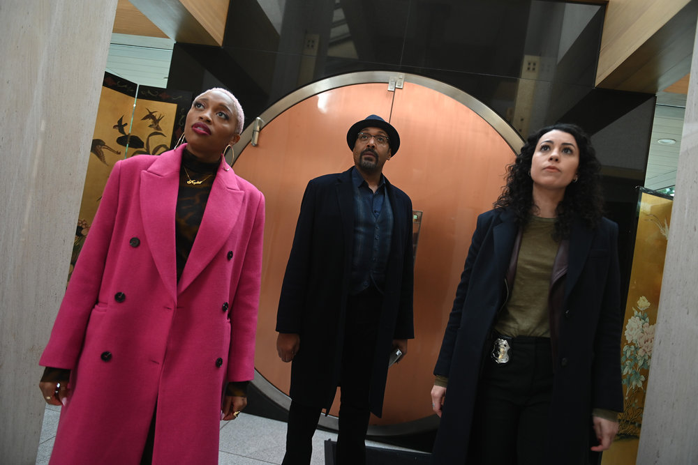 Still from The Irrational Season 1 Episode 9 of Travina Springer as Kylie, Jesse L. Martin as Alec Mercer, and Paloma Nozicka as Morgan pictured left to right.
