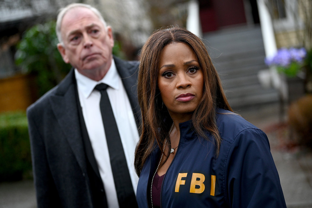 Still from The Irrational Season 1 Episode 10 of Garry Chalk as Bob Caswith and Maahra Hill as Marisa pictured from left to right.