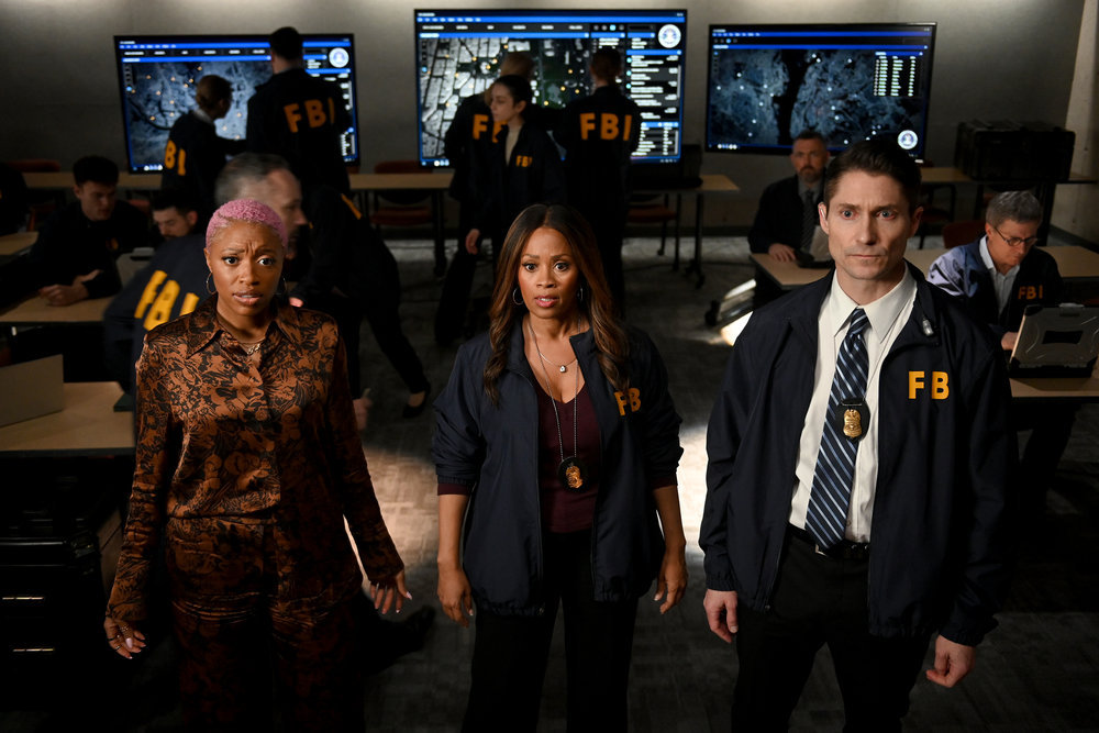 Still from The Irrational Season 1 Episode 10 of Travina Springer as Kylie, Maahra Hill as Marisa, and Matthew Maccaull as Agent Dennis Mackay pictured from left to right.