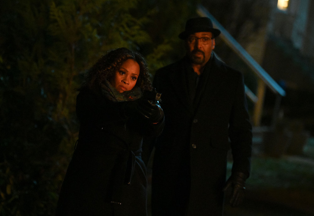 Still from The Irrational Season 1 Episode 11 of Maahra Hill as Marisa and Jesse L. Martin as Alec Mercer pictured from left to right.