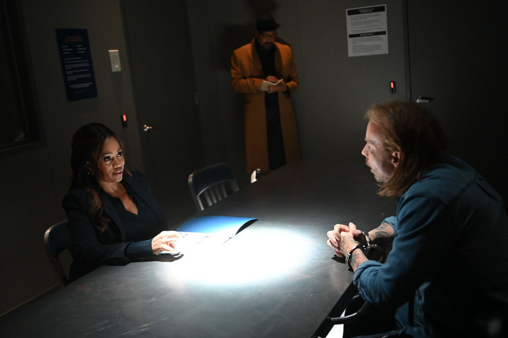 Still from the Irrational Season 1 Episode 11 of Maahra Hill as Marisa, Jesse L. Martin as Alec Mercer, and Steven Roberts as James Belfast pictured from left to right.