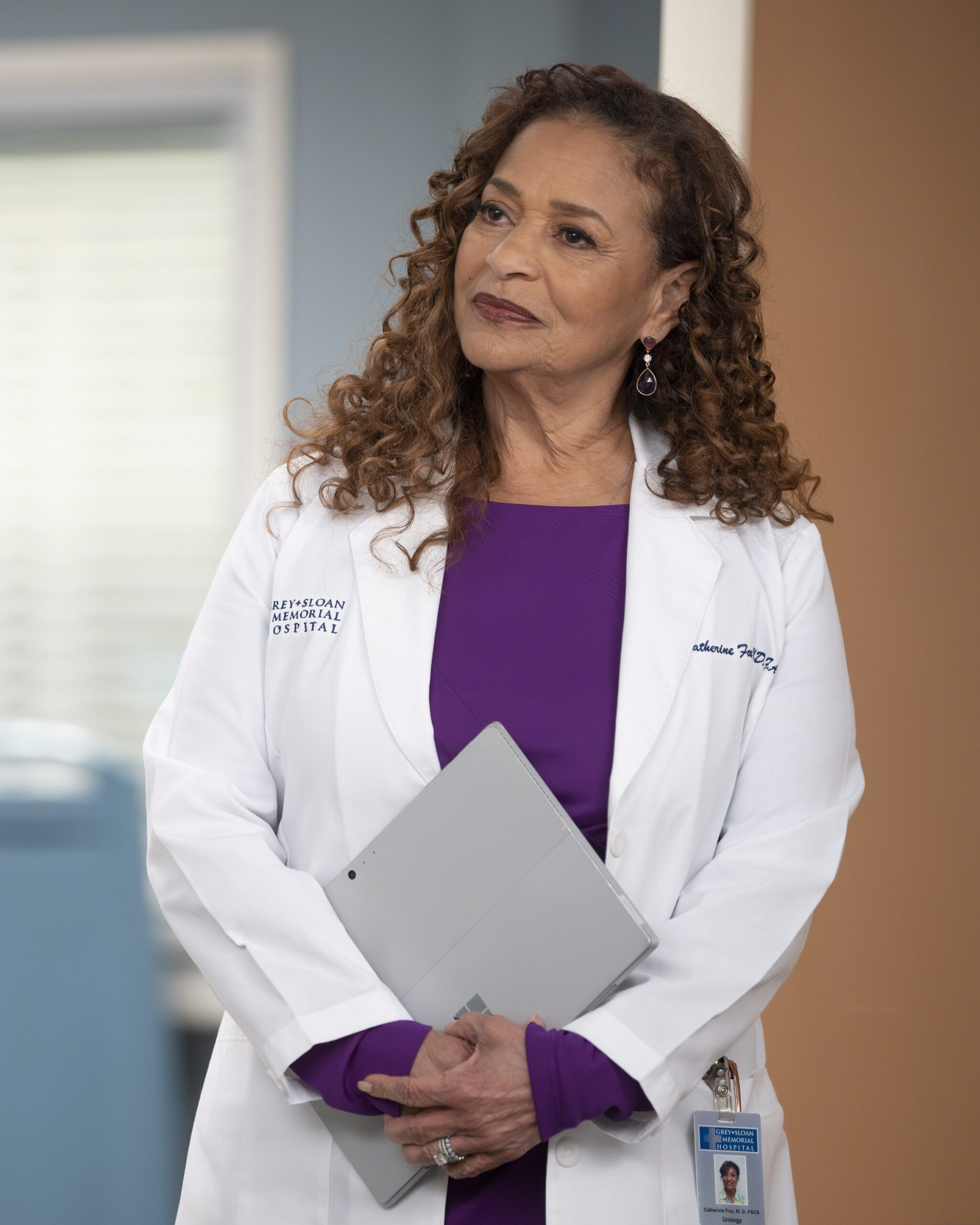 DEBBIE ALLEN as Catherine Fox, in purple and a lab coat on Grey's Anatomy Season 20 Episode 3, "Walk the Ocean"