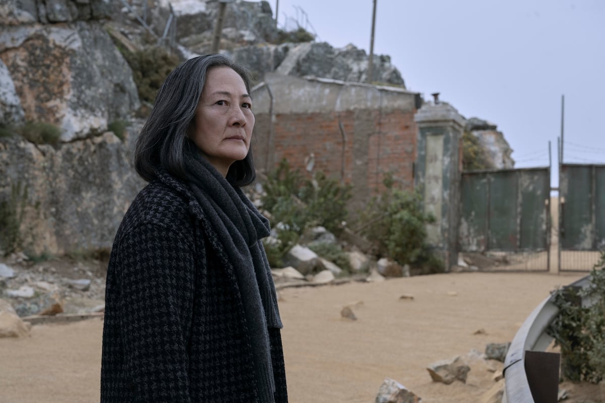 3 Body Problem Season 1 Episode 7 Rosalind Chao as Ye Wenjie standing outside a compound