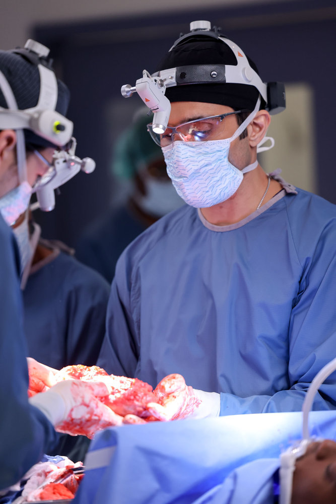 Chicago Med - Season 9 Episode 8 Dominic Rains as Dr. Crocket Marcel holds a patient Preview — Chicago Med Season 9 Episode 8: A Telepathic Patient Visits the ED Chicago Med - Season 9 Episode 8 Dominic Rains as Dr. Crocket Marcel holds a patient's heart in his hand mid-surgery.'s heart in his hand mid-surgery.