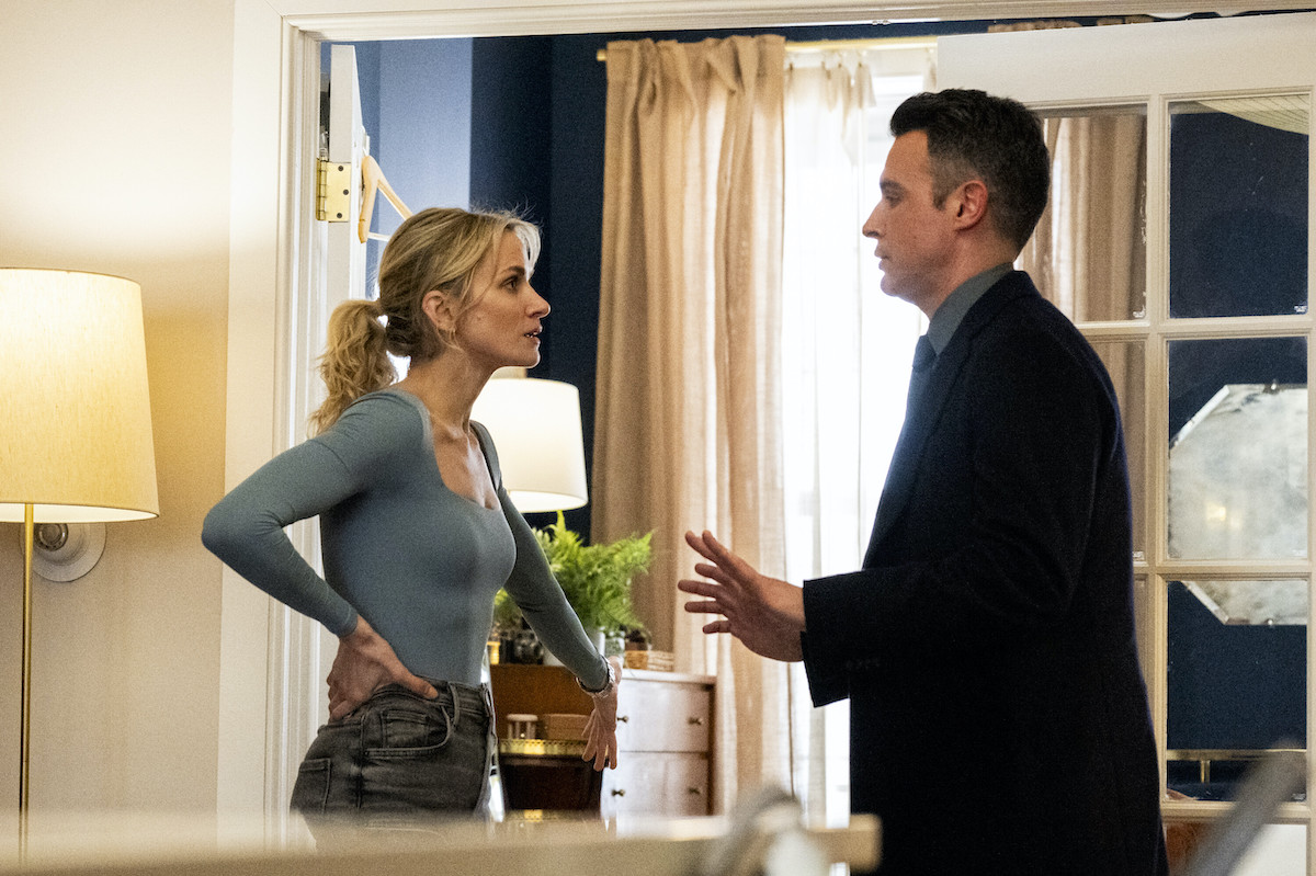 FBI: Most Wanted Season 5 Episode 8 Supply Chain Shantel VanSanten as Special Agent Nina Chase and John Boyd as Special Agent Stuart Scola standing in a room
