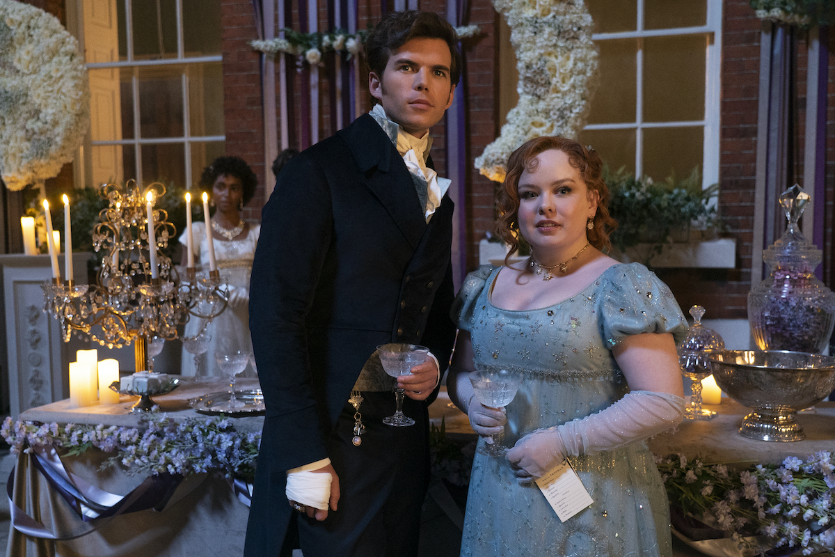BRIDGERTON Season 3 Episode 2 | Tell-Tale TV BRIDGERTON Season 3 Episode 2 Luke Newton as Colin Bridgerton, Nicola Coughlan as Penelope Featherington at a ball