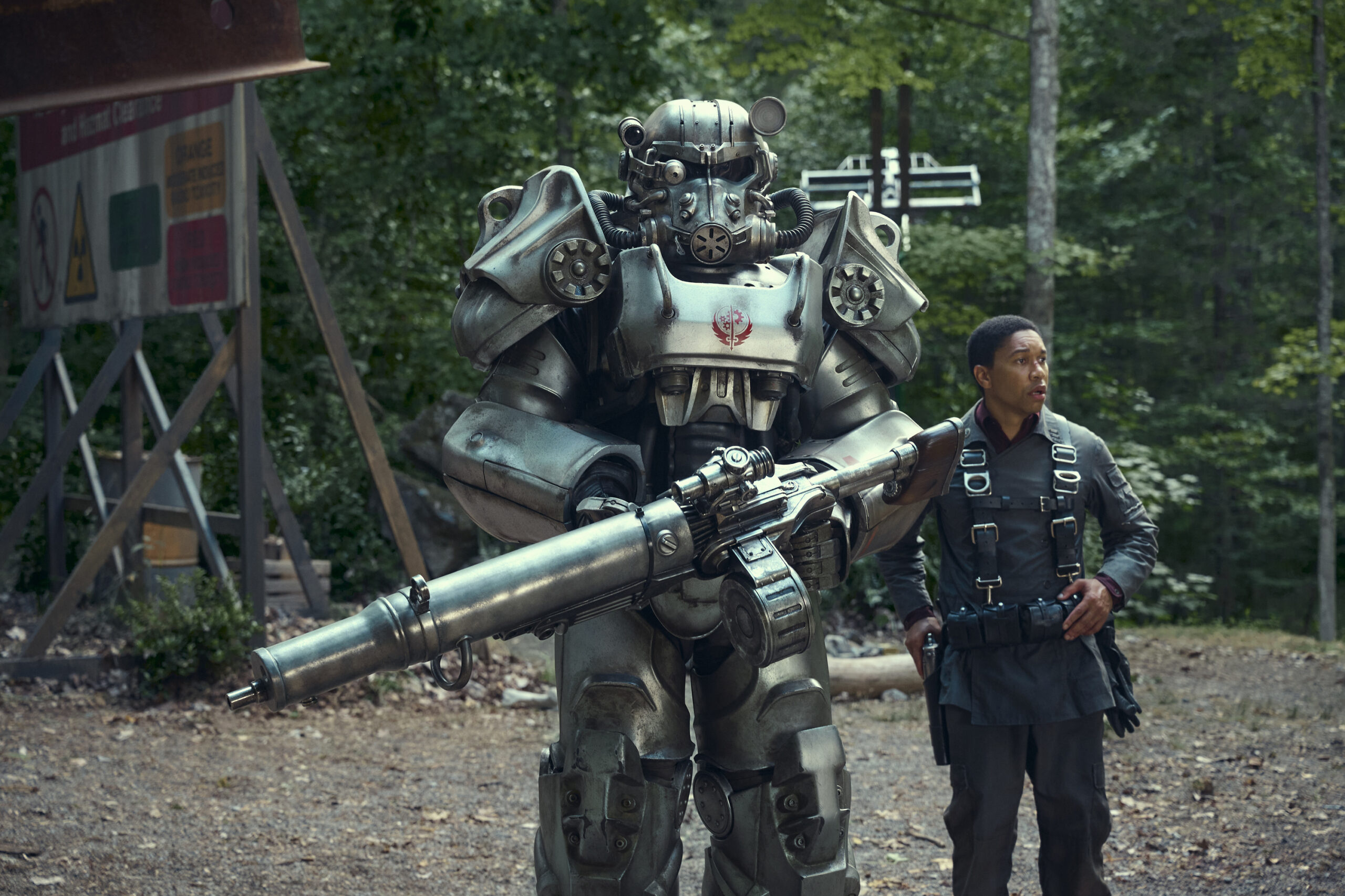 Fallout - First Look | Tell-Tale TV Fallout Season 1 Episode 2, "The Target" T-60 aka Lord Knight Titus and Maximus standing at attention in a forest