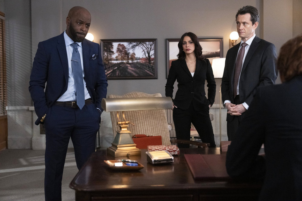 Law & Order - Season 23 | Tell-Tale TV Law & Order Season 23 Episode 10 - Alimi Ballard as Counselor Ron Delahunt, Odelya Halevi as ADA Samantha Maroun, and Hugh Dancy as ADA Nolan Price stand in judges chambers.