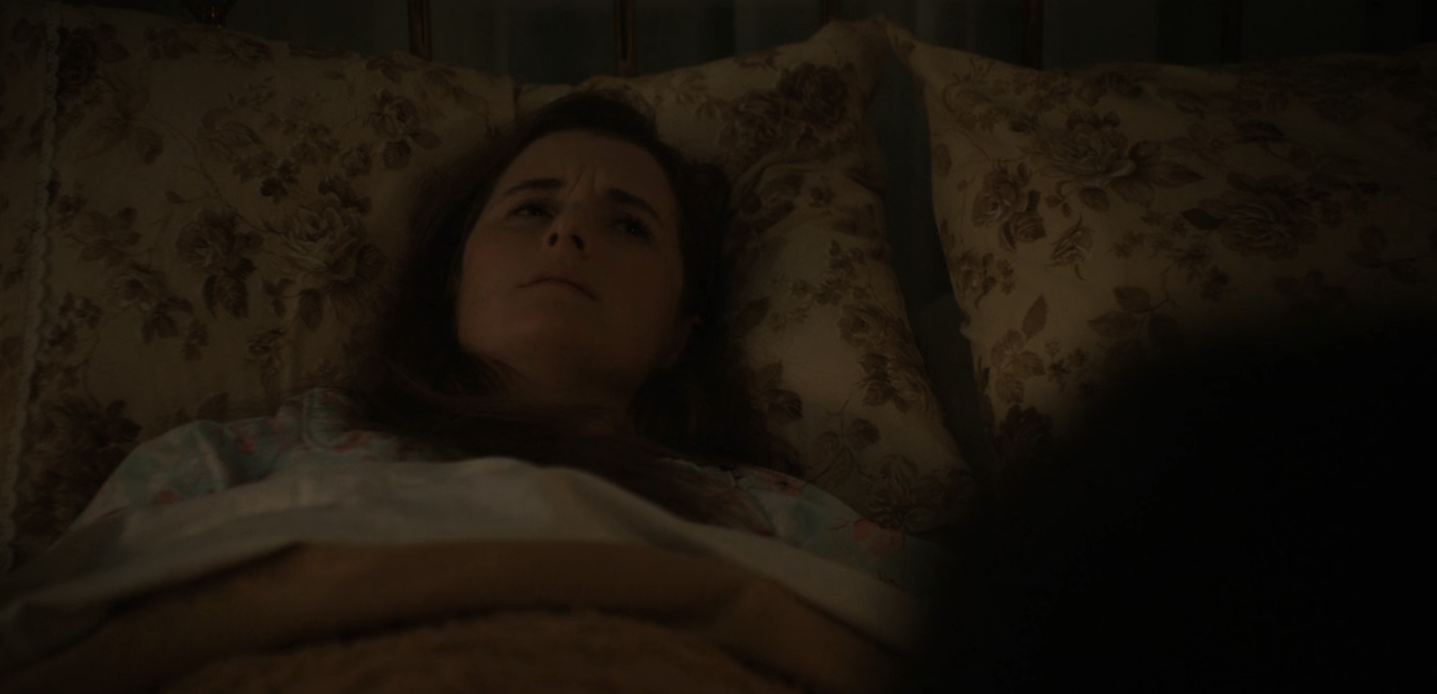 American Horror Story: Delicate Season 12 Episode 6, "Opening Night." Grace Gummer as Margaret Alcott laying in bed American Horror Story: Delicate Season 12 Episode 6 Review: Opening Night